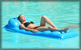 Amber Heard sunbathing on a floating Mattress on a Swimming Pool