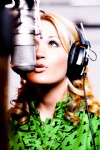 Carrie Underwood singing with Headphones on