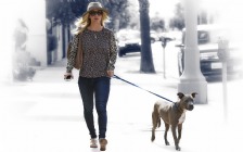 Kaley Cuoco walking with a Dog