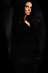 Mila Kunis in a Black Suit
