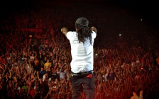 Lil Wayne on the Stage, a Crowd of Cheering Fans