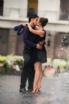 Love Couple kissing near Fountain