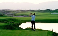Man Playing Golf in Bahrain
