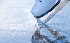Woman Skates Braking Ice, Macro